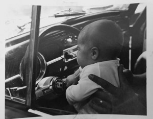 Baby AH Behind the wheel of Dad's Morgan